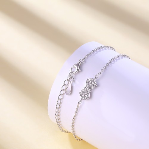 Gleamique - Pulseira em moissanite com motivo de laço e corrente ajustável