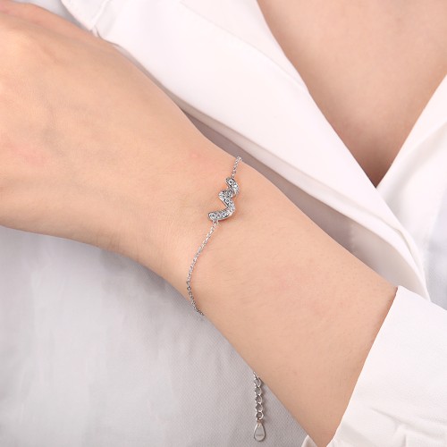 Serpentine - Pulseira em moissanite com símbolo do infinito e pedras cravadas em pavé